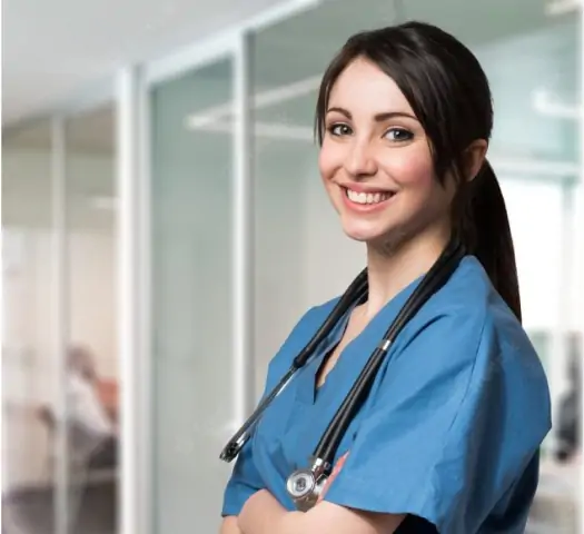 In a close-up shot, a female doctor smiles at the camera